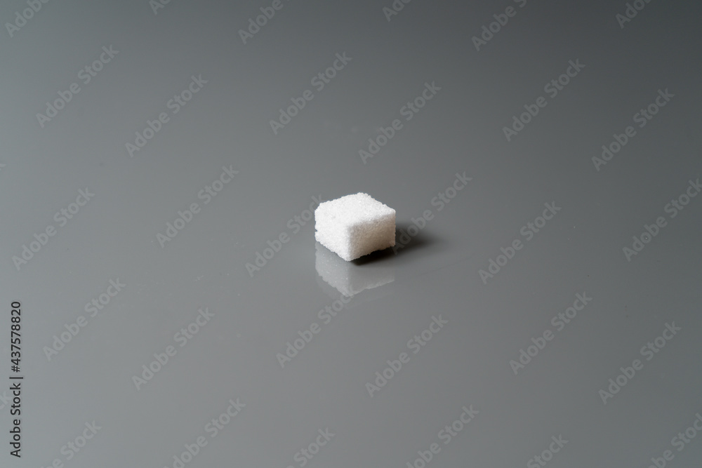 Sugar cubes in different arrangements and colored light. Bavaria Germany . Arrow, Pile, Cube, Square, Sugar cubes in different arrangements and colored light. Bavaria Germany . Arrow, Pile, Cube, Square,