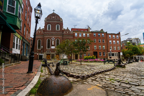 Wide angle image of North Square with Sacred Heart Italian Church in Boston