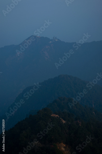 beautiful view of layers of mountains during blue hour