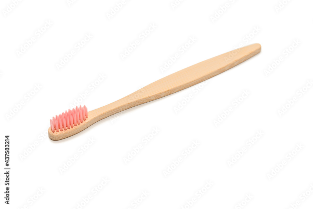 Bamboo toothbrush isolated on a white background. Bamboo toothbrush isolated on a white background.