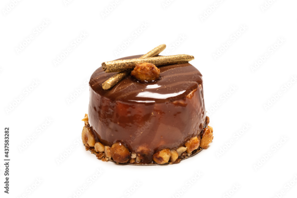 Chocolate and caramel cake isolated on a white background. Chocolate and caramel cake isolated on a white background.