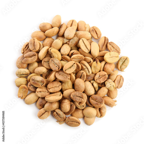 Heap of roasted coffee beans isolated on white, top view