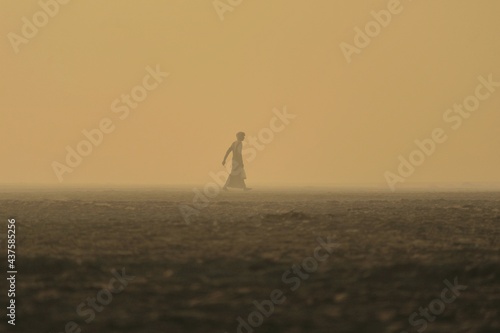 person walking on the field