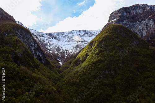 Snow capped mountains at spring in Nærøyfjord, Norway