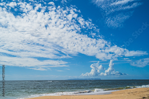 Ni'ihau island off the coast of Kauai, Hawaii and blue sky and clouds photo