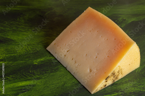 Portion of cured manchego cheese photo