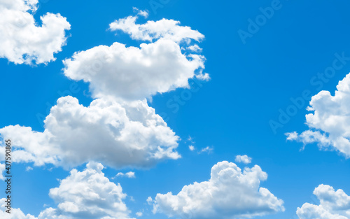 White clouds on the blue sky  background
