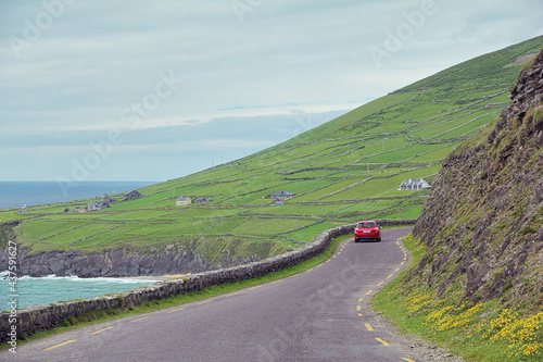 Slea Head Drive is a spectacular driving route that forming part of the Wild Atlantic Way that weaves and twists around the coast from Dingle, County Kerry, Ireland.