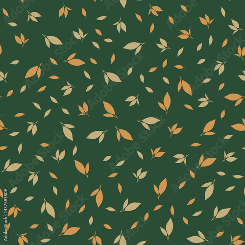 Pattern with leaves on a green background. Vector image.