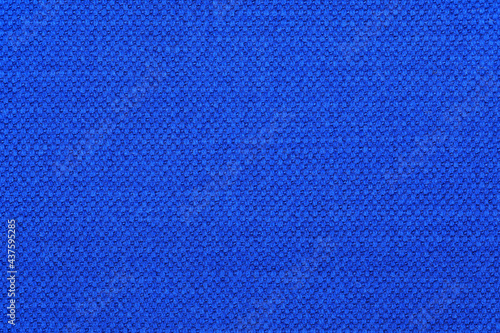 Blue fabric background and texture with copy space, view from above