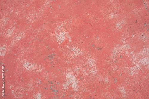 Abstract background of dusty pink color, texture of colored worn tiles.