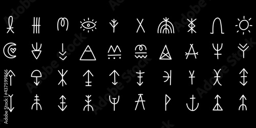 Hand drawn magical symbols with moon, sun and rainbow elements isolated on black background vector illustration.