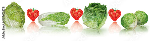 Horizontal composition of green cabbages and heart shaped tomatoes