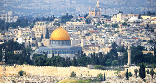 Panoramic View of Jerusalem Old City.  Holy Site of Dome of the Rock on Temple Mount  Ayyubid Mosque of Oma  old cemetery are in view. Telephoto compression and depth of View.
