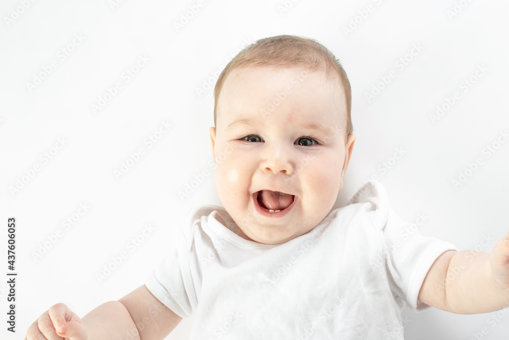 Portrait of smiling baby looking at camera Portrait of smiling baby looking at camera
