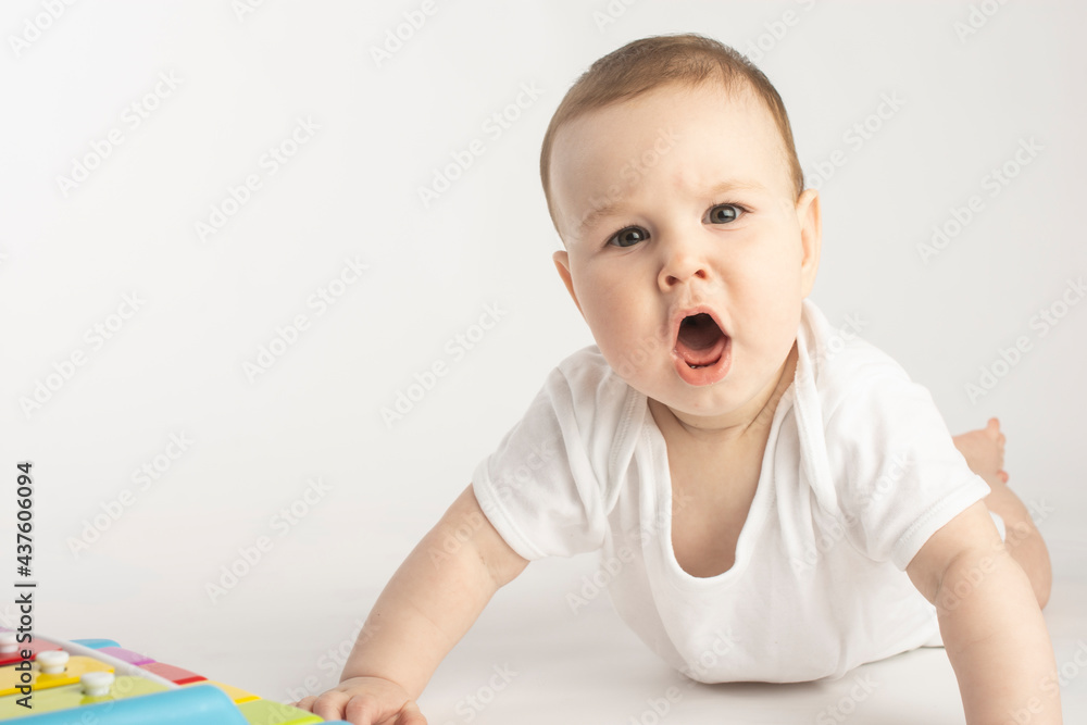 disgruntled baby looking at the camera. disgruntled baby looking at the camera.
