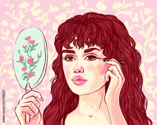 illustration of a beautiful dark-haired woman with a mirror in her hands that paints her eyelashes with mascara. pink background  floral ornament