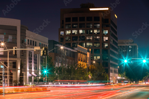 Canvas Print Night time view of traffic passing through Harbor Boulevard in downtown Anaheim, California, USA