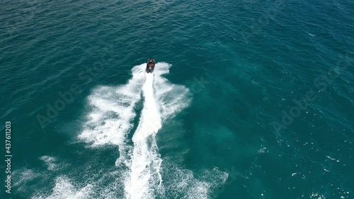 Wallpaper Mural Aerial drone video of jet ski watercraft cruising in high speed in tropical exotic island Torontodigital.ca