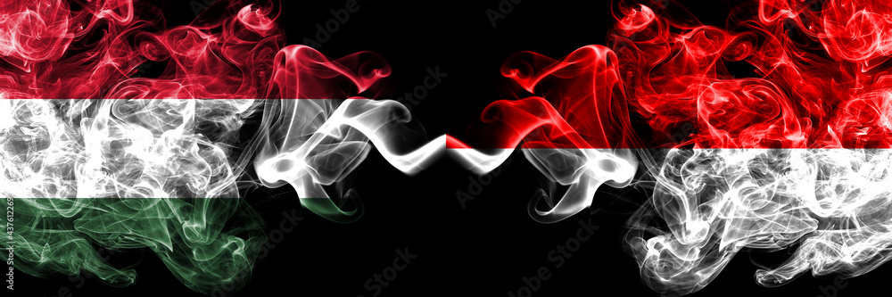 Hungary, Hungarian vs Indonesia, Indonesian smoky flags side by side.