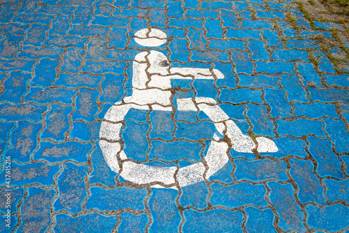 Painted wheelchair parking sign