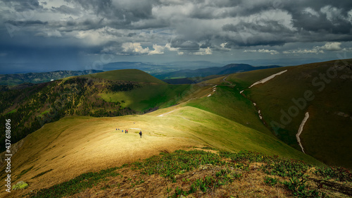 Fototapeta Naklejka Na Ścianę i Meble -  Walk among mountains and thunderstorms