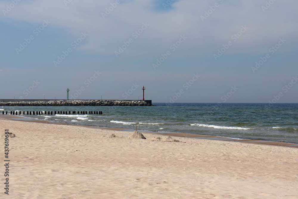Sea breakwater as a navigation point - Dziwnów, Poland Sea breakwater as a navigation point - Dziwnów, Poland
