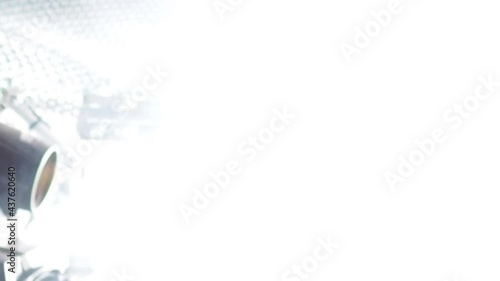 Stage lighting fixture in the form of a row of bulbs flickers in the fog in a loop