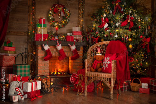 Fotografia Festive interior inside wooden house, New Year's cheerful mood Spirit of Christm