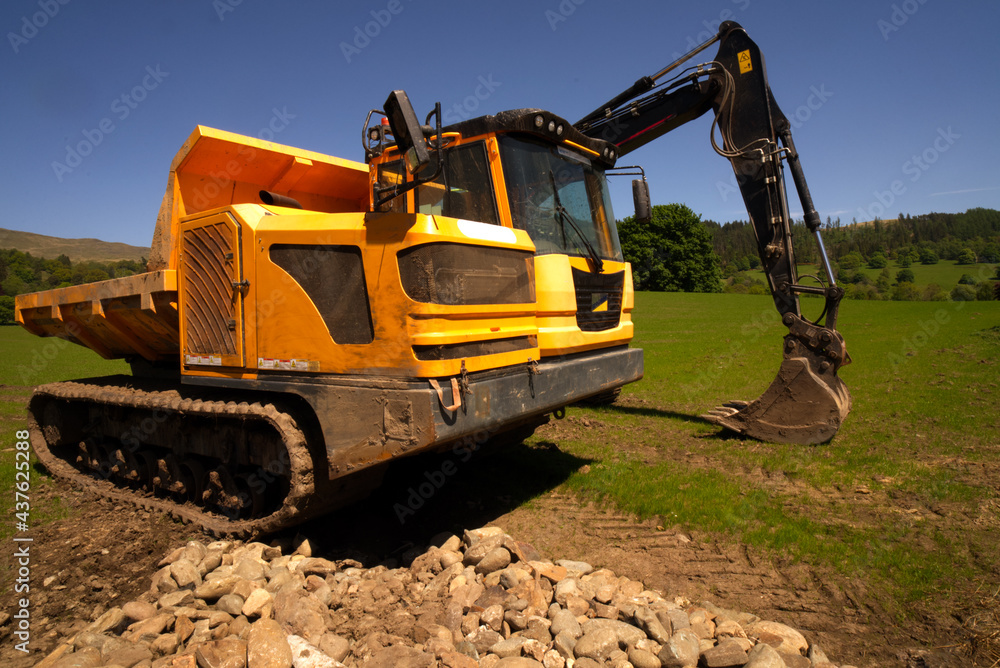 Excavators are heavy construction equipment consisting of a boom, dipper, bucket and cab on a rotating platform known as the 