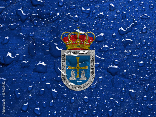 flag of Oviedo, Spain with rain drops photo