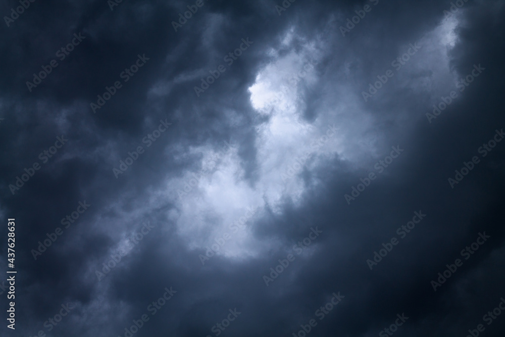 Atmosphere of overcast dusk sky before to rainy. Moody natural weather background. Dramatic storm cloudy and dark sky. Dark clouds over sunset sky.