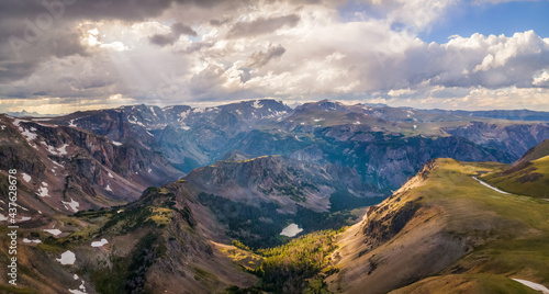 Dramatic clouds and sunlight on the Beartooth Highway scenic byway - overlook