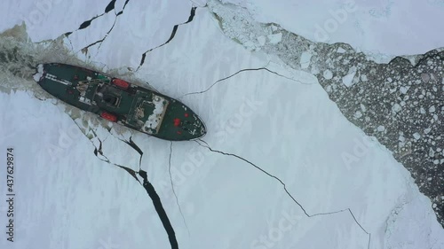 The sea vessel is moving in the ice.