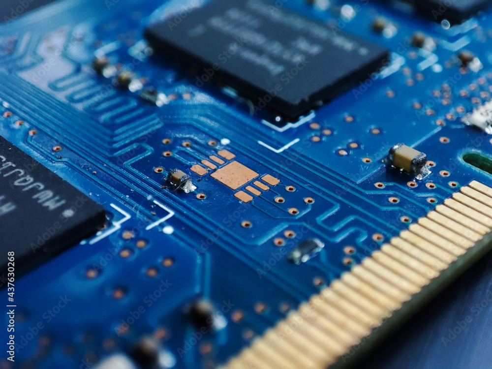 Blue colour Printed Circuit Board with golden pins and micro chips Blue colour Printed Circuit Board with golden pins and micro chips