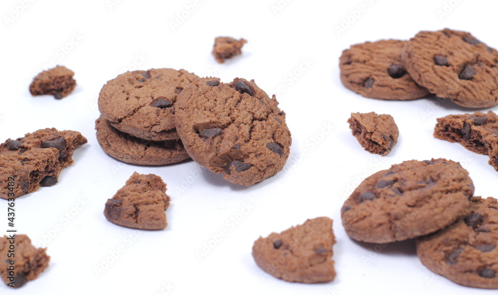 Spread of choco chip cookies, delicious tasty on isolated white background Spread of choco chip cookies, delicious tasty on isolated white background