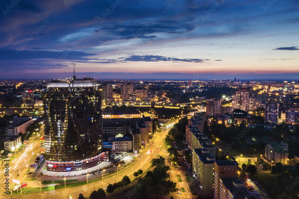 panoramic view of Minsk city on sunset. aerial cityscape view with illuminated buildings and streets.