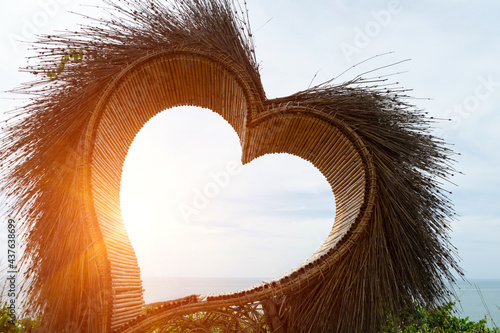 Heart shaped nest chair  is handicraft  manmade from wood, twing or limb for sitting to relax or celebrate for love or valentine's day. photo