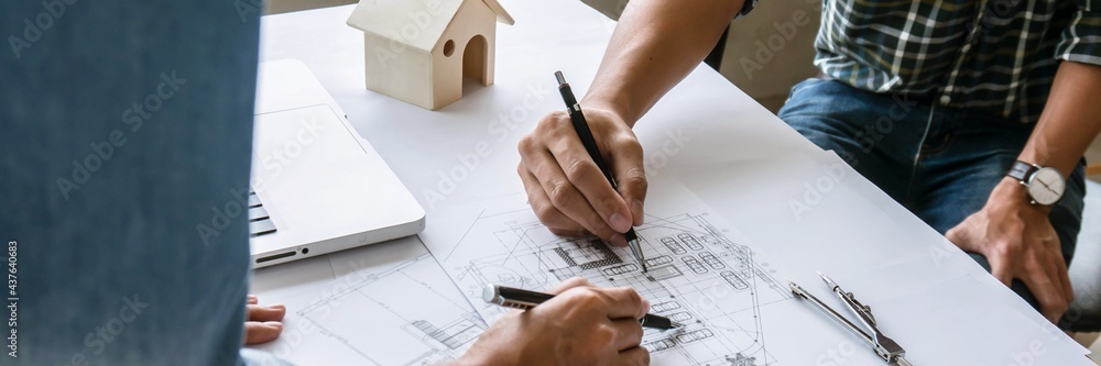 Architecture drawing on architectural project business architecture building construction Colleagues interior designer Corporate Planning Design on blueprint Teamwork with compasses. - obrazy, fototapety, plakaty 