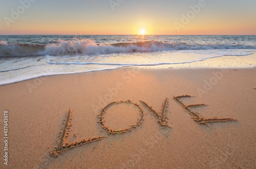 Love on sea shore during the sunset