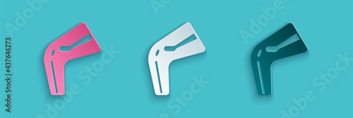 Paper cut Bone pain icon isolated on blue background. Orthopedic medical. Disease of the joints and bones, arthritis. Paper art style. Vector