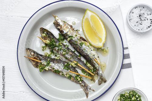 Homemade Grilled Sardines with Garlic, Olive Oil, Fresh Parsley, and Lemon