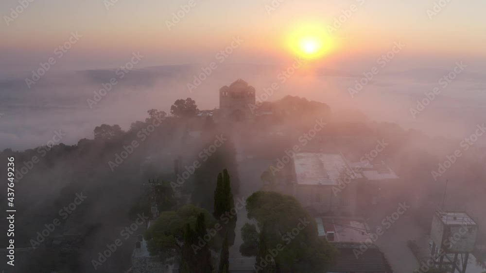 Aerial view over Mount Tavor and Church of the Transfiguration
Drone view from North Israel at sunrise covered with clouds, 2021
Aerial view over Mount Tavor and Church of the Transfiguration
Drone view from North Israel at sunrise covered with clouds, 2021