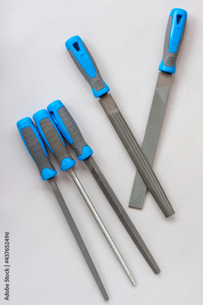 Set of new rasp files on gray background. Working tools layout Set of new rasp files on gray background. Working tools layout