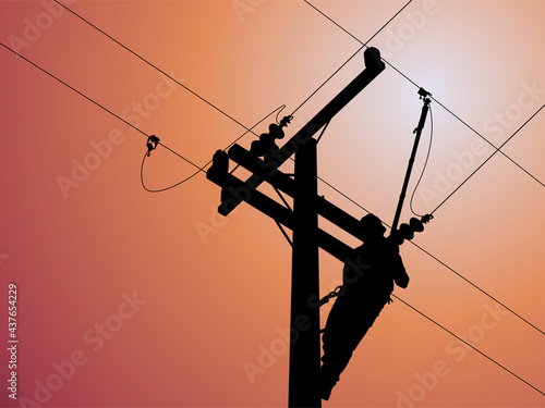 Silhouette of power lineman uses a clamp stick grip all type to install the line cover on energized high-voltage electric power lines. To change the lightning arresters that is damaged. photo