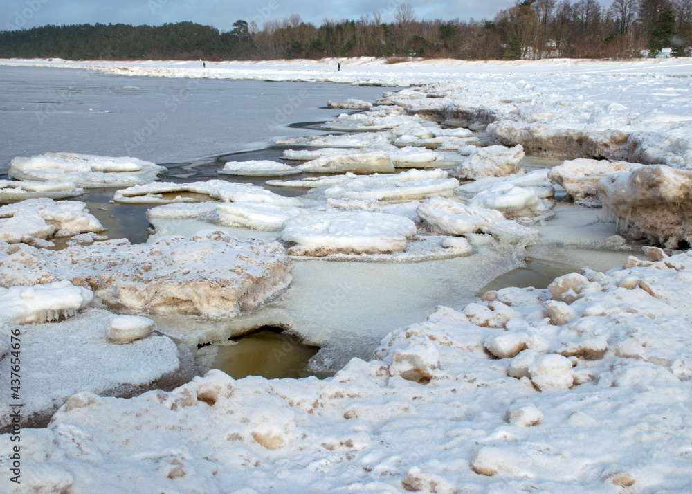 landscape by the sea, snowy pieces of ice by the sea and ice texture at sea, dunes covered with a layer of white snow landscape by the sea, snowy pieces of ice by the sea and ice texture at sea, dunes covered with a layer of white snow