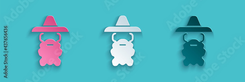 Paper cut Wizard warlock icon isolated on blue background. Paper art style. Vector
