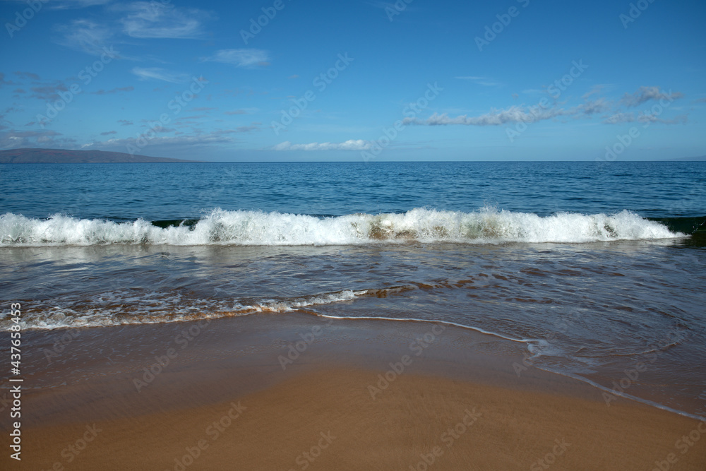 Summer vacation at a tropical beach. Paradise beach with sand and clear water of the sea. Ocean beach background.