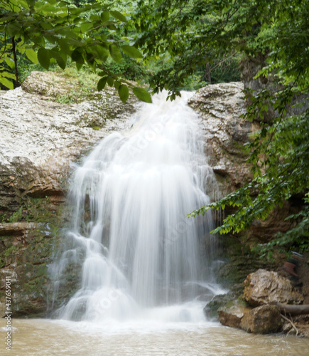 Fototapeta Naklejka Na Ścianę i Meble -  Beautiful waterfall in a dense forest