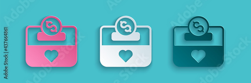 Paper cut Donation and charity icon isolated on blue background. Donate money and charity concept. Paper art style. Vector